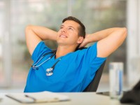attractive medical doctor relaxing in office